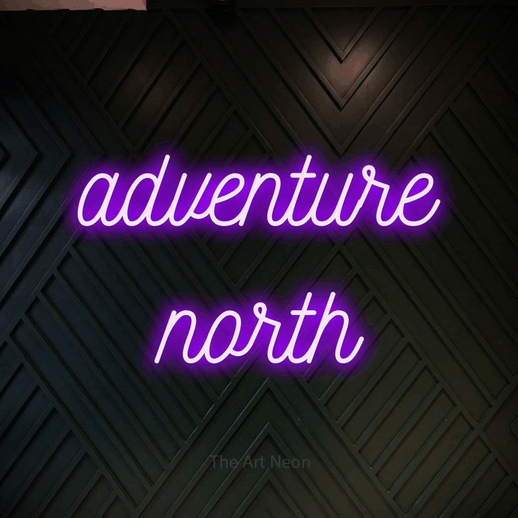 Purple script-style LED neon sign reading "Adventure North" against a dark geometric wood wall