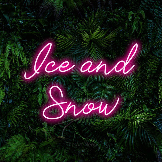 Hot pink script-style LED neon sign reading "Ice and Snow" against a dense tropical foliage wall
