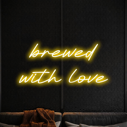 Yellow LED neon sign reading "Brewed with Love" against a black textured wall