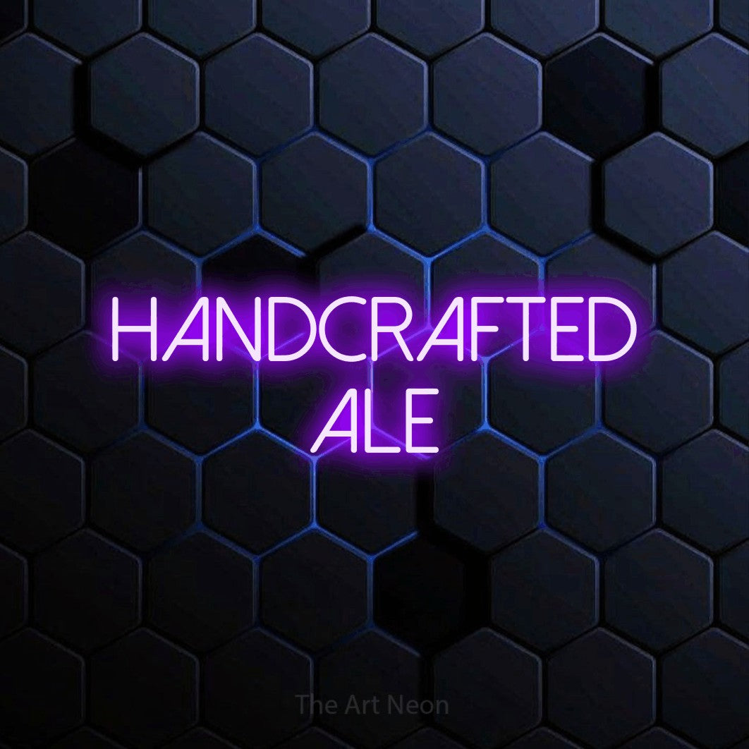Purple LED neon sign reading "Handcrafted Ale" against a blue hexagonal wall