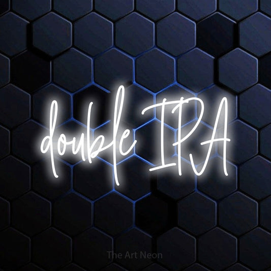 Cool white script-style LED neon sign reading "Double IPA" against a blue hexagonal wall