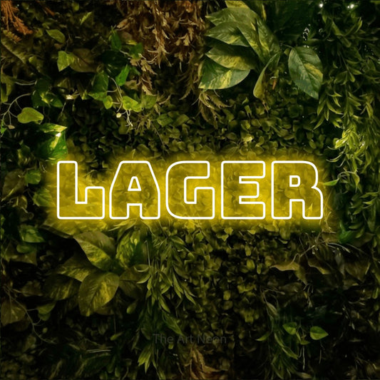 Yellow outline-style LED neon sign reading "Lager" against a textured moss and foliage wall