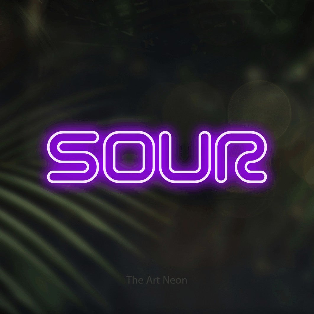 Purple outline-style LED neon sign reading "Sour" against dark blurred palm leaves