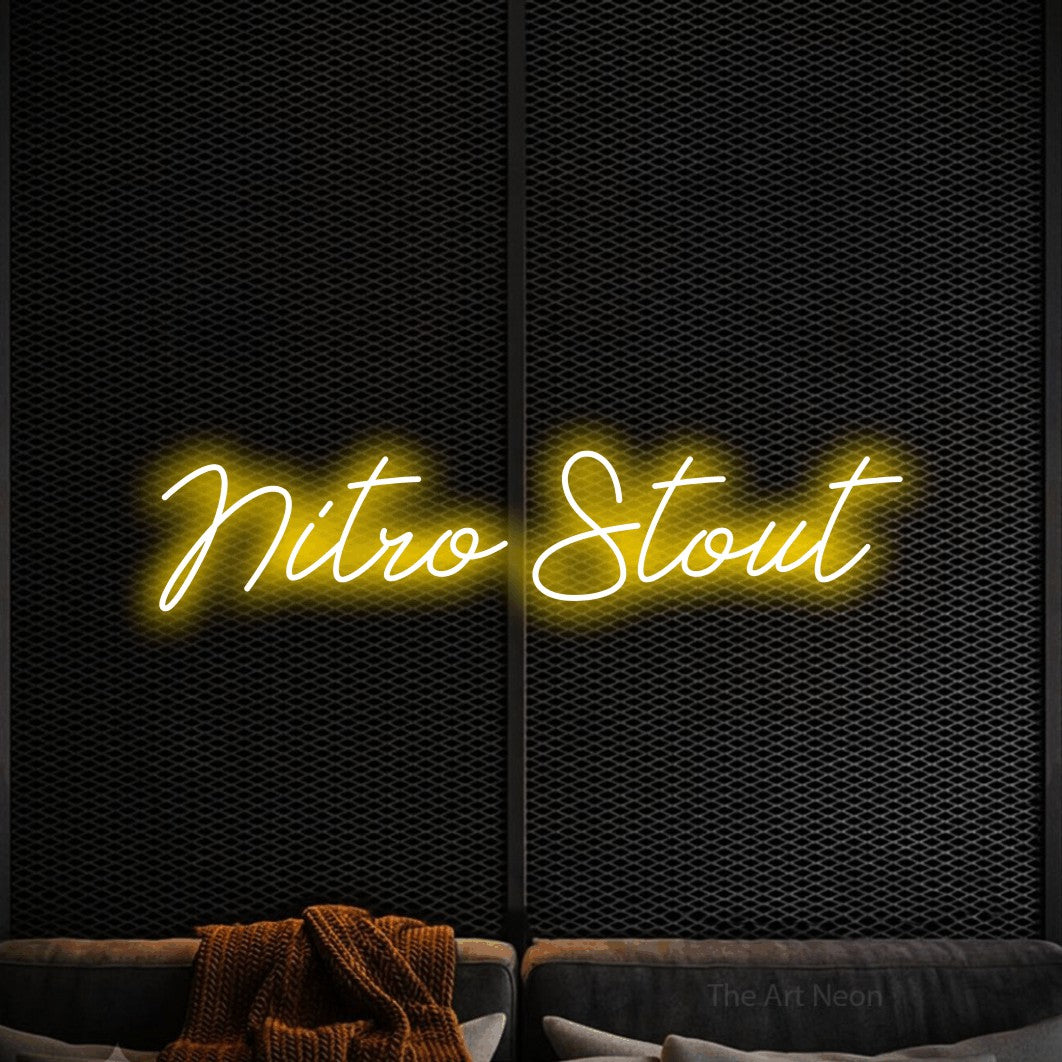 Yellow script-style LED neon sign reading "Nitro Stout" against a black textured wall