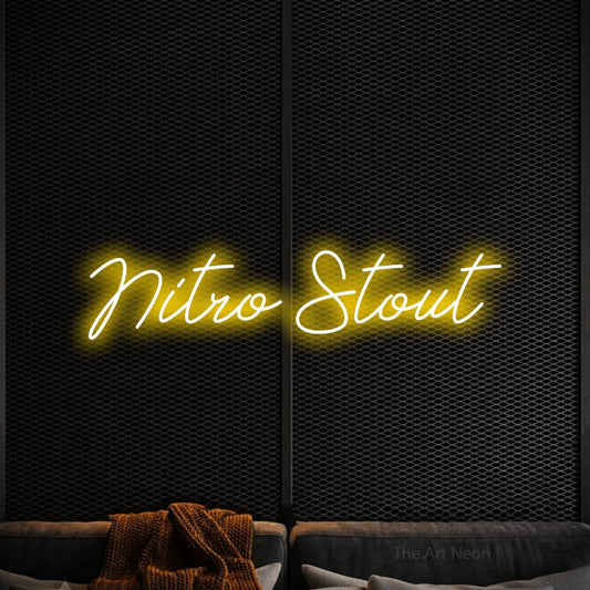 Yellow script-style LED neon sign reading "Nitro Stout" against a black textured wall