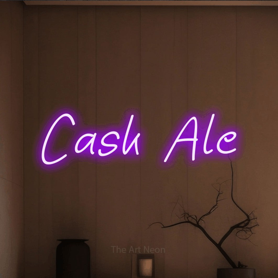 Purple LED neon sign reading "Cask Ale" against a warm brown wall