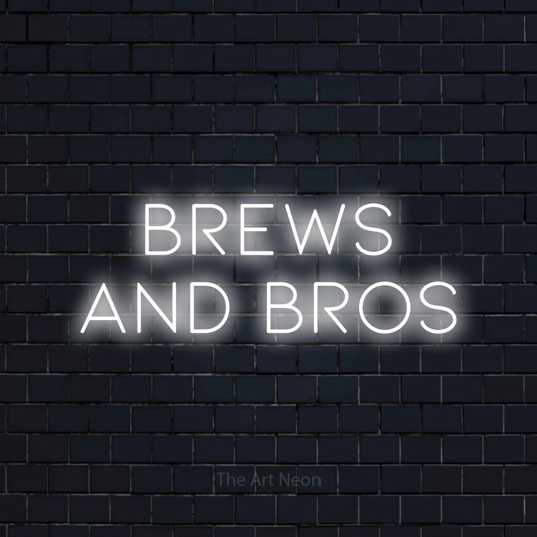 Cool white LED neon sign reading "Brews and Bros" against a dark navy brick wall