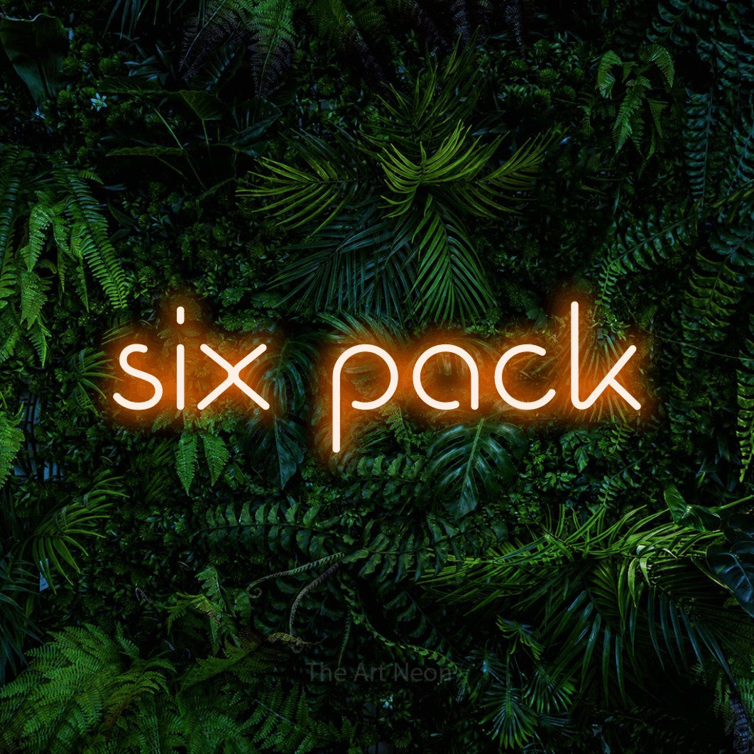 Orange LED neon sign reading "Six Pack" against a dense tropical foliage wall