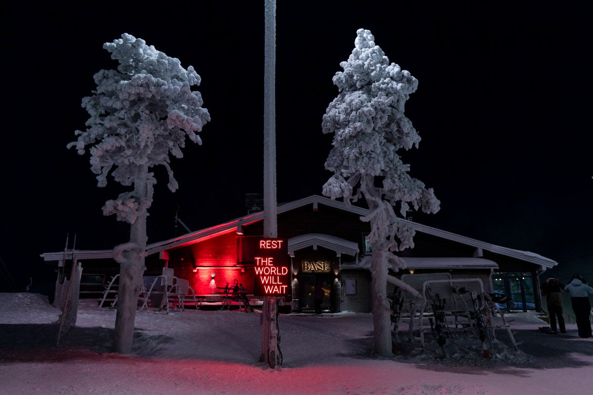 Outdoor LED neon text installation at Ruka Polar Night Light Festival in Finland