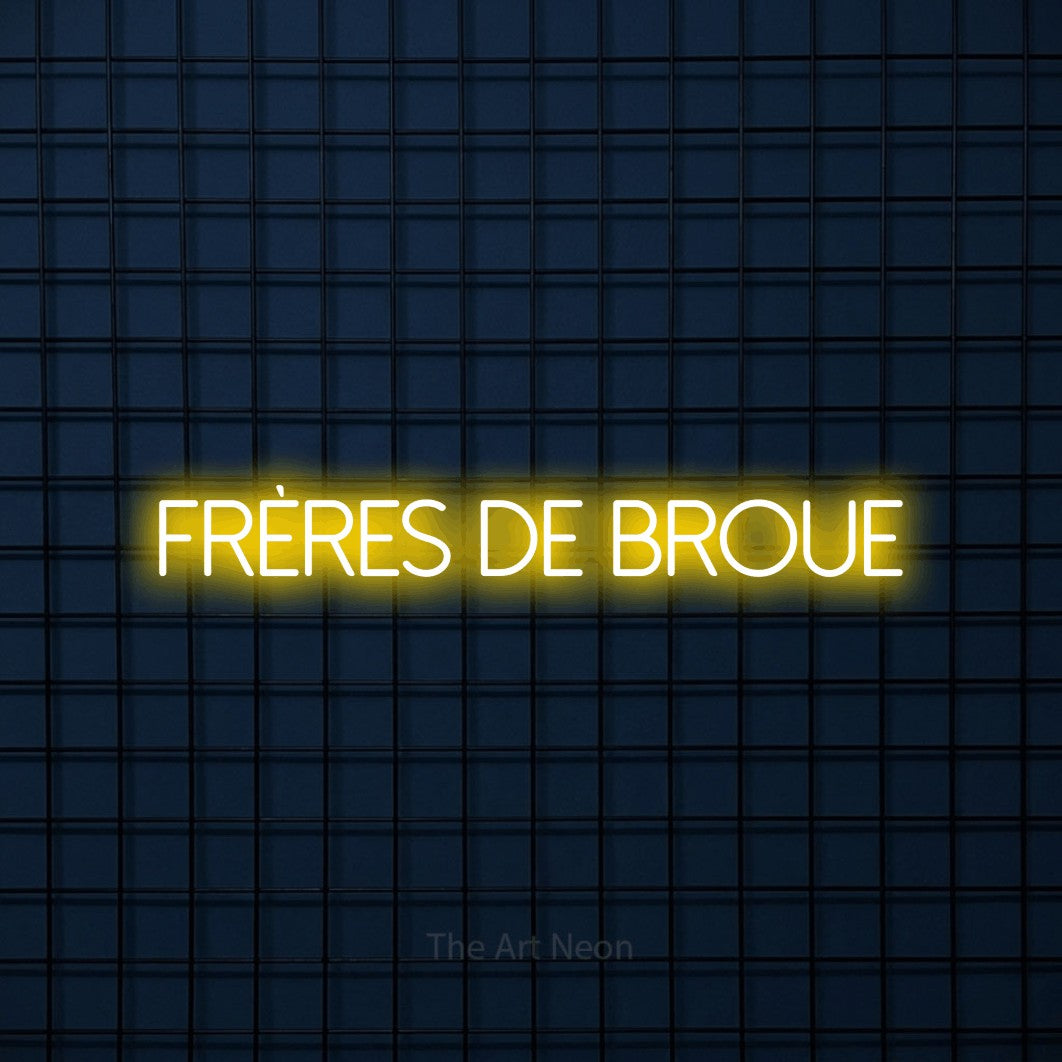 “Frères de broue” LED neon sign in yellow, with thin sans-serif lettering, shown against a dark blue grid.