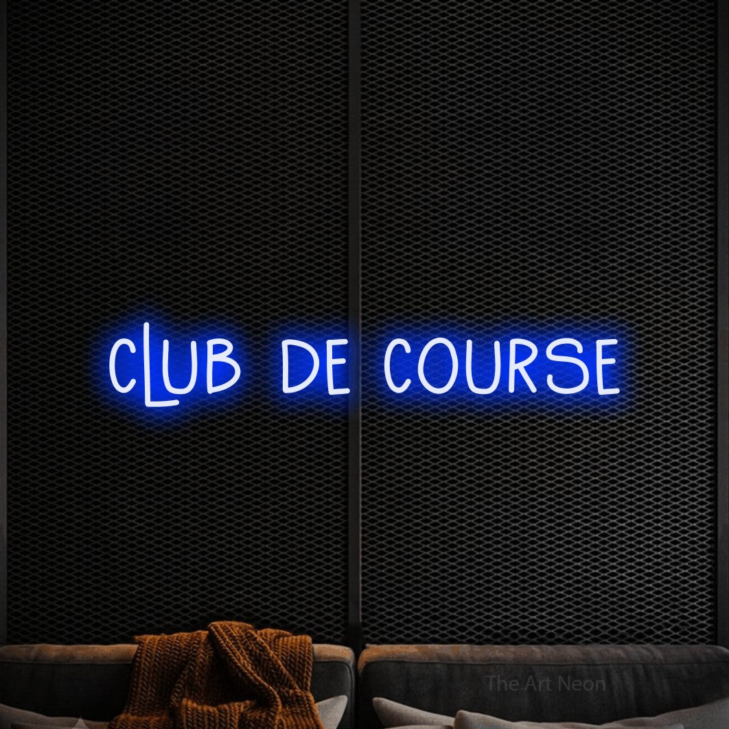 “Club de course” LED neon sign in blue, with narrow hand-drawn lettering, shown against a modern dark-toned seating area.