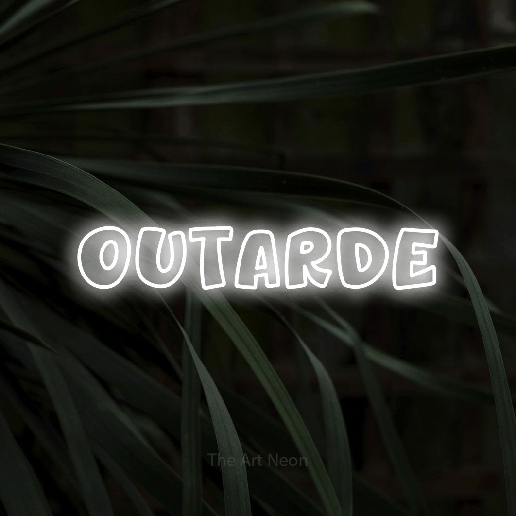 “Outarde” LED neon sign in cool white, with rounded outline lettering, shown against a close-up of dark foliage.