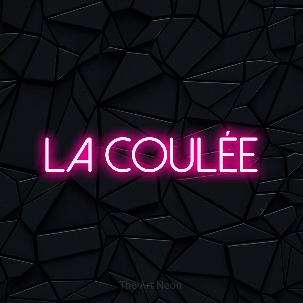 “La coulée” LED neon sign in hot pink, with thin sans-serif lettering, shown against a black polygonal surface.
