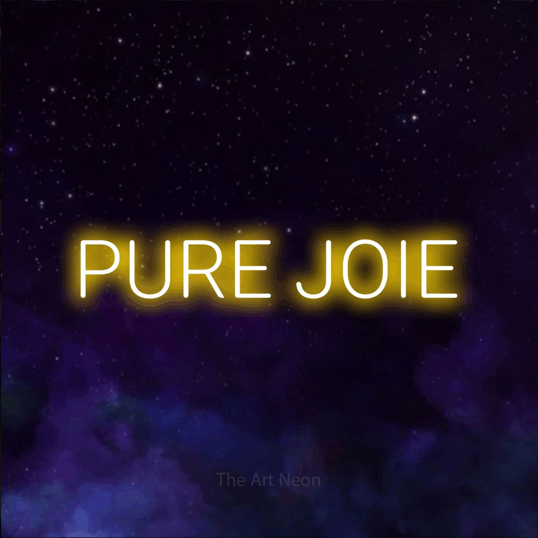 “Pure joie” LED neon sign in yellow, with rounded sans-serif lettering, shown against a purple galaxy backdrop.