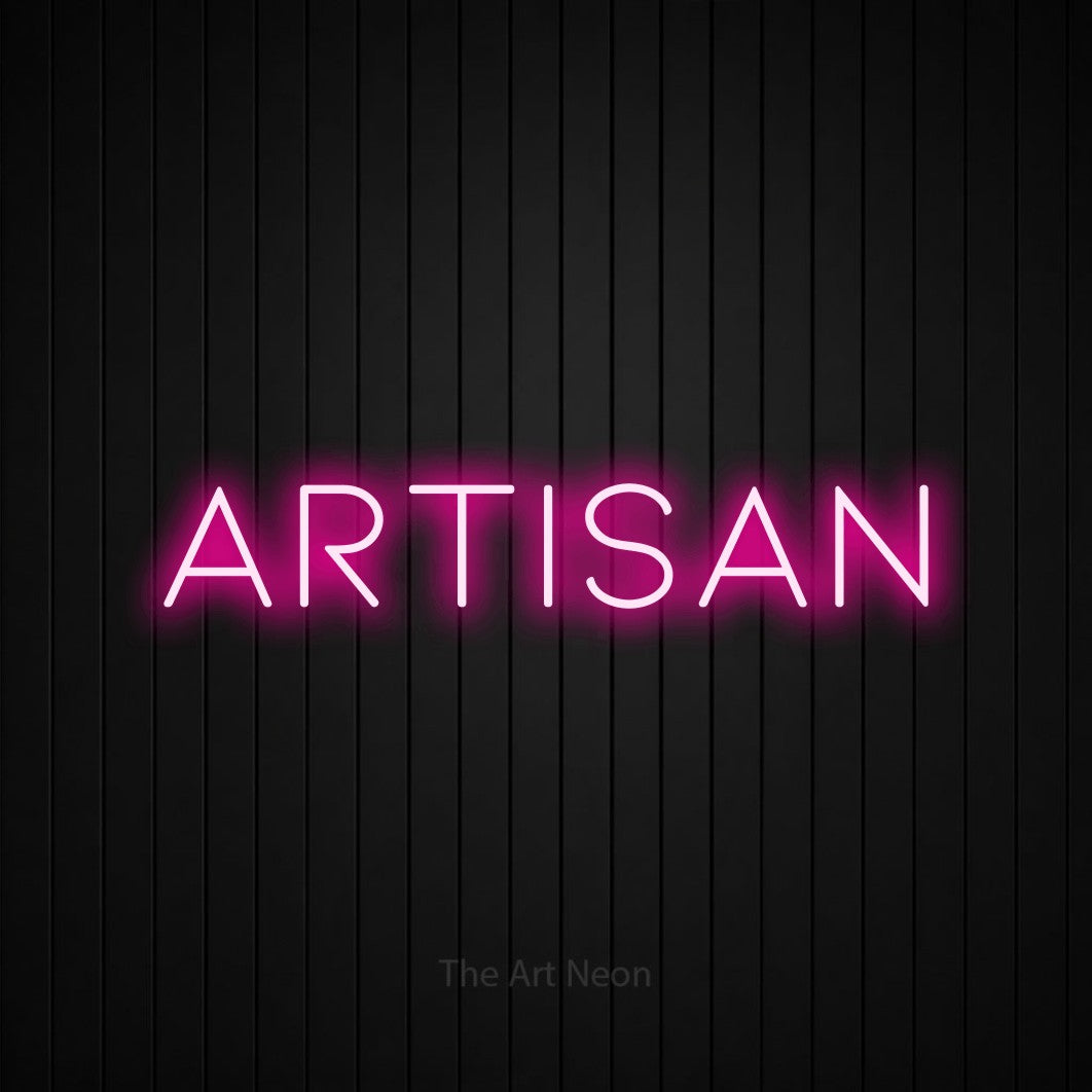 “Artisan” LED neon sign in hot pink, with thin, widely spaced lettering, shown against black vertical wall slats.