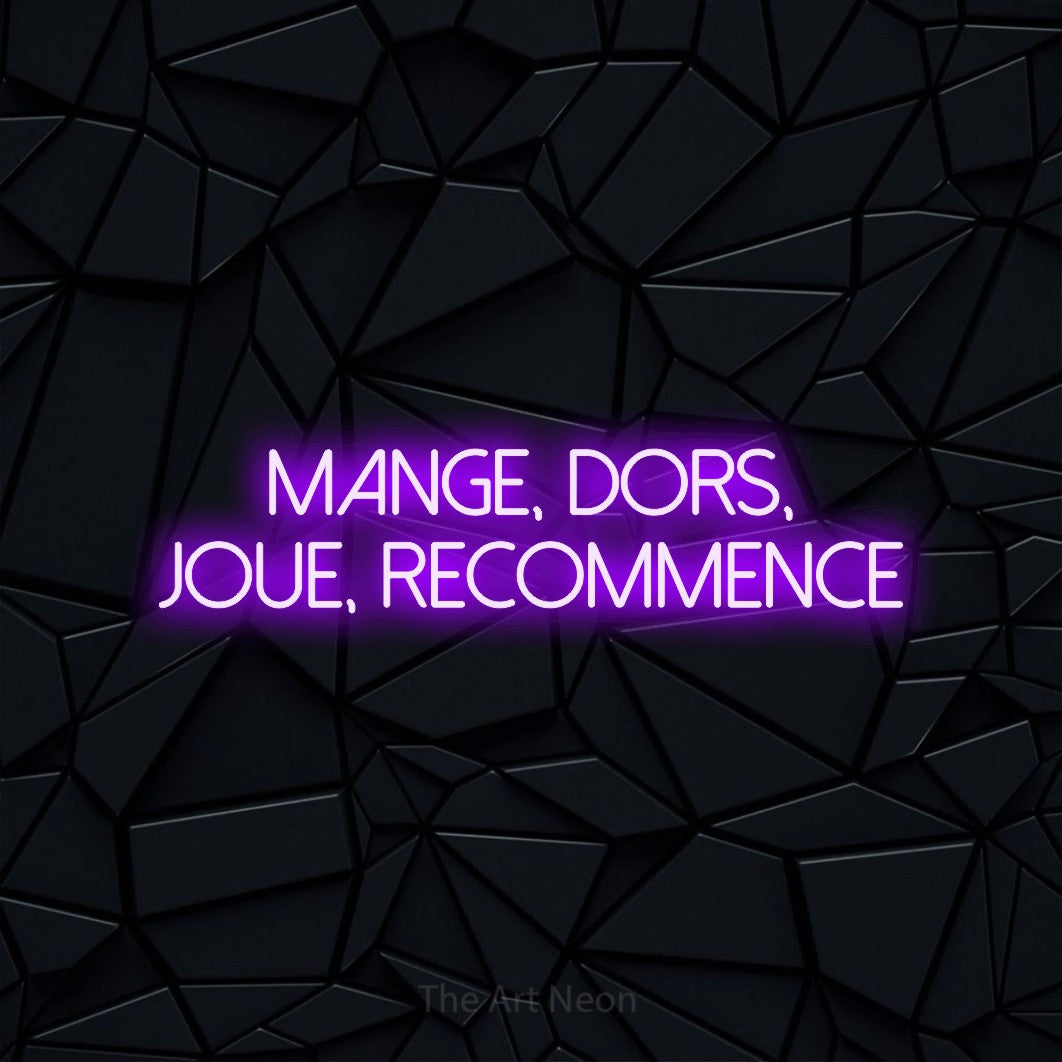 “Mange, dors, joue, recommence” LED neon sign in purple, with thin sans-serif lettering across 2 lines, shown against a black polygonal surface.