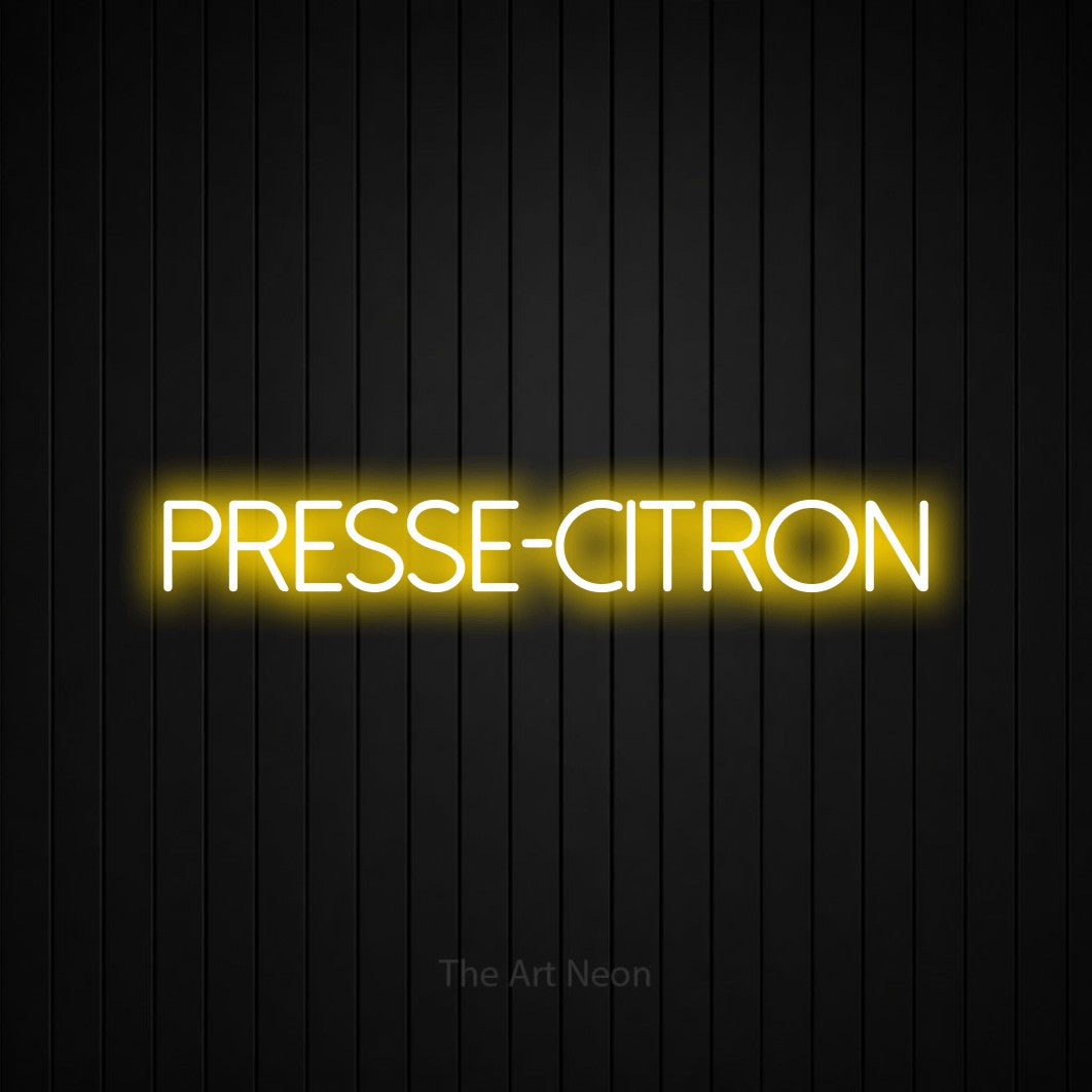 “Presse-citron” LED neon sign in yellow, with thin sans-serif lettering, shown against black vertical wall slats.