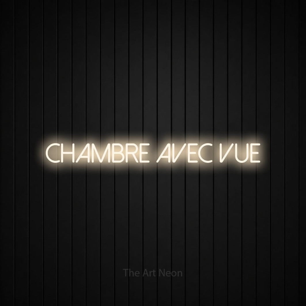 “Chambre avec vue” LED neon sign in warm white, with thin sans-serif lettering, shown against black vertical wall slats.