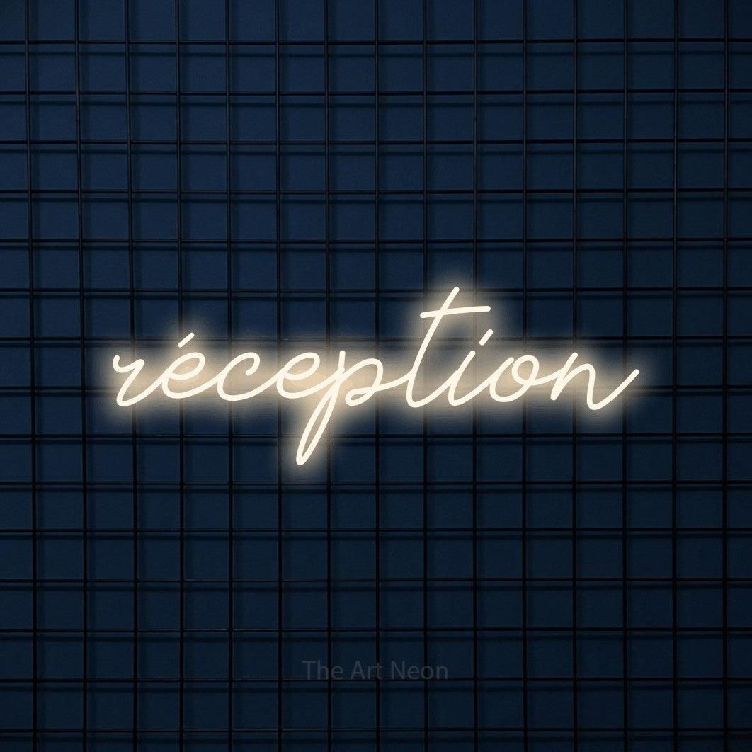 “Réception” LED neon sign in warm white, with cursive lettering, shown against a dark blue grid.