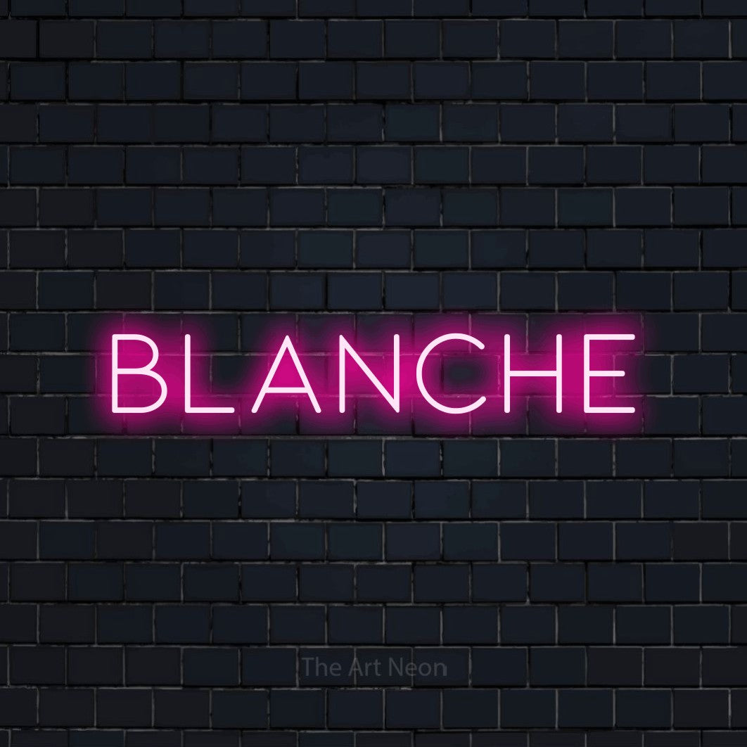 “Blanche” LED neon sign in hot pink, with thin, widely spaced lettering, shown against a dark navy brick wall.
