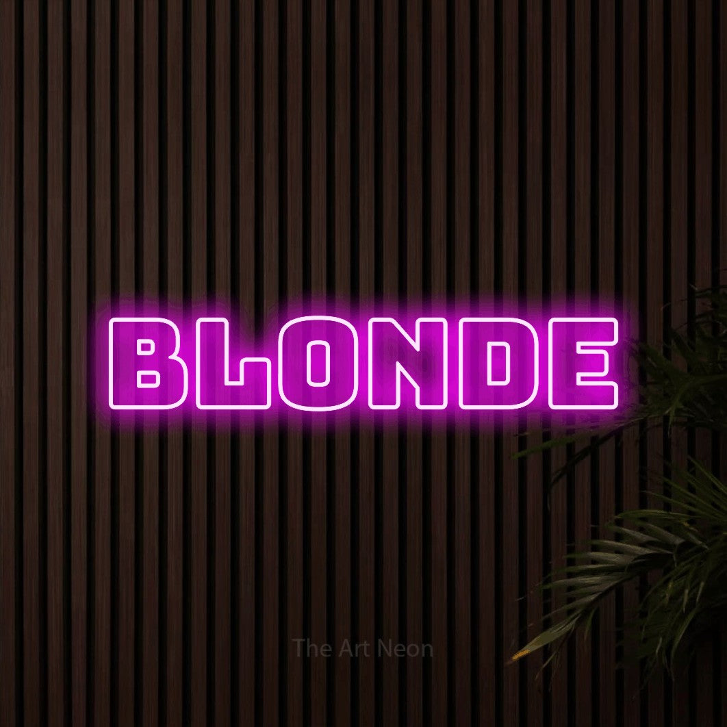 “Blonde” LED neon sign in pink, with bold outline lettering, shown against dark wooden wall slats.