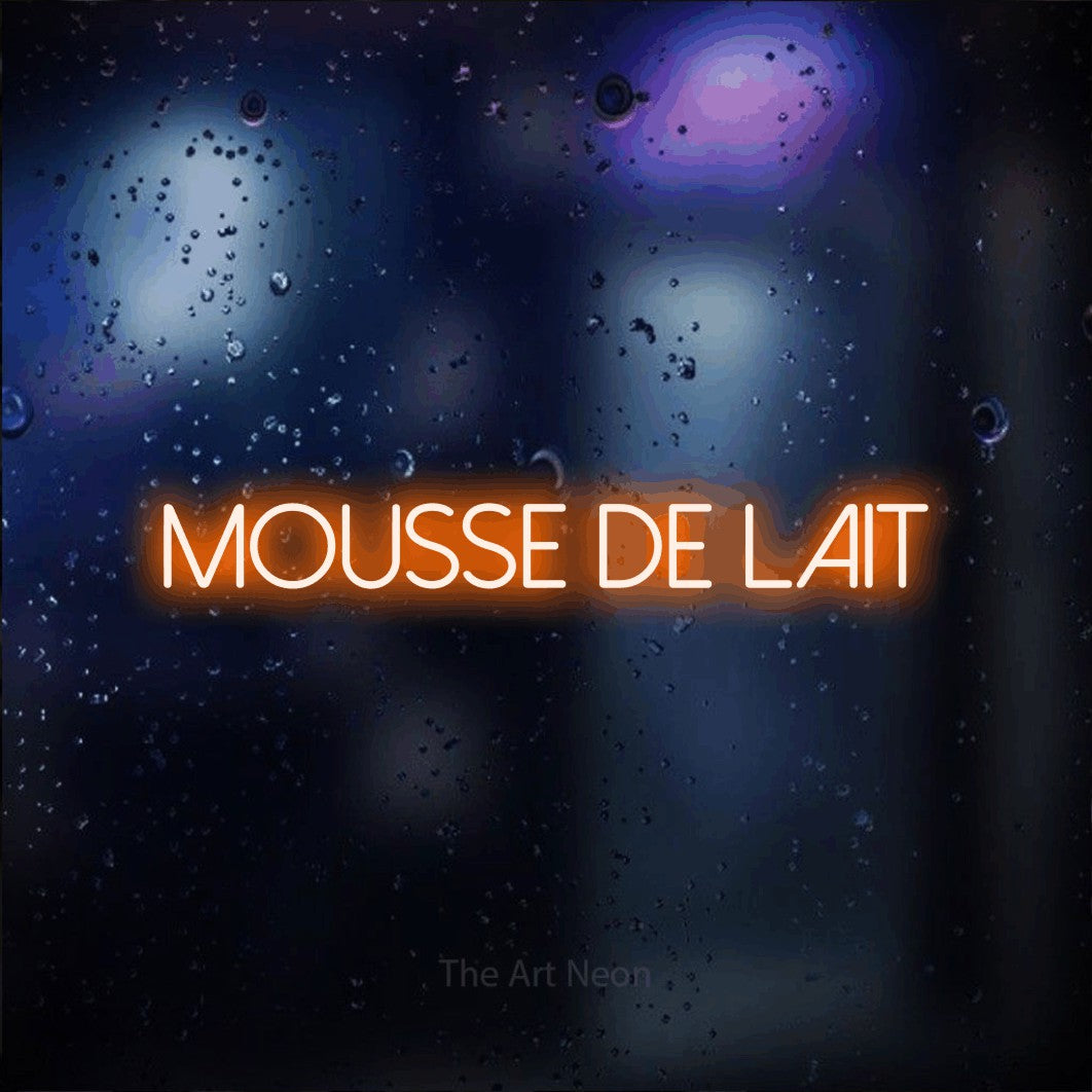 “Mousse de lait” LED neon sign in orange, with thin sans-serif lettering, shown against glass with blue and purple reflections.