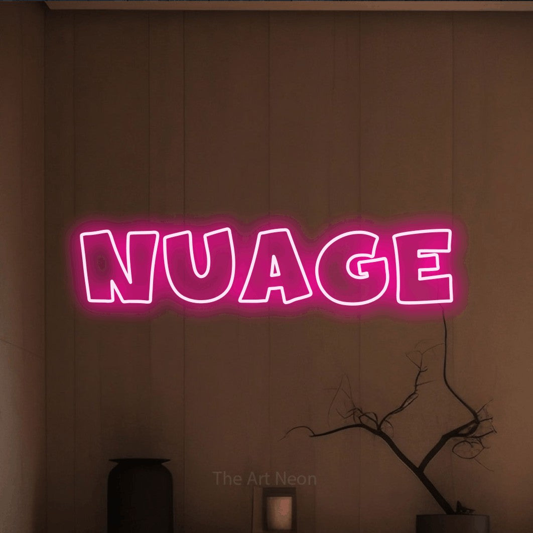 “Nuage” LED neon sign in hot pink, with wide lettering with irregular outlines, shown against a simple earth-toned interior.