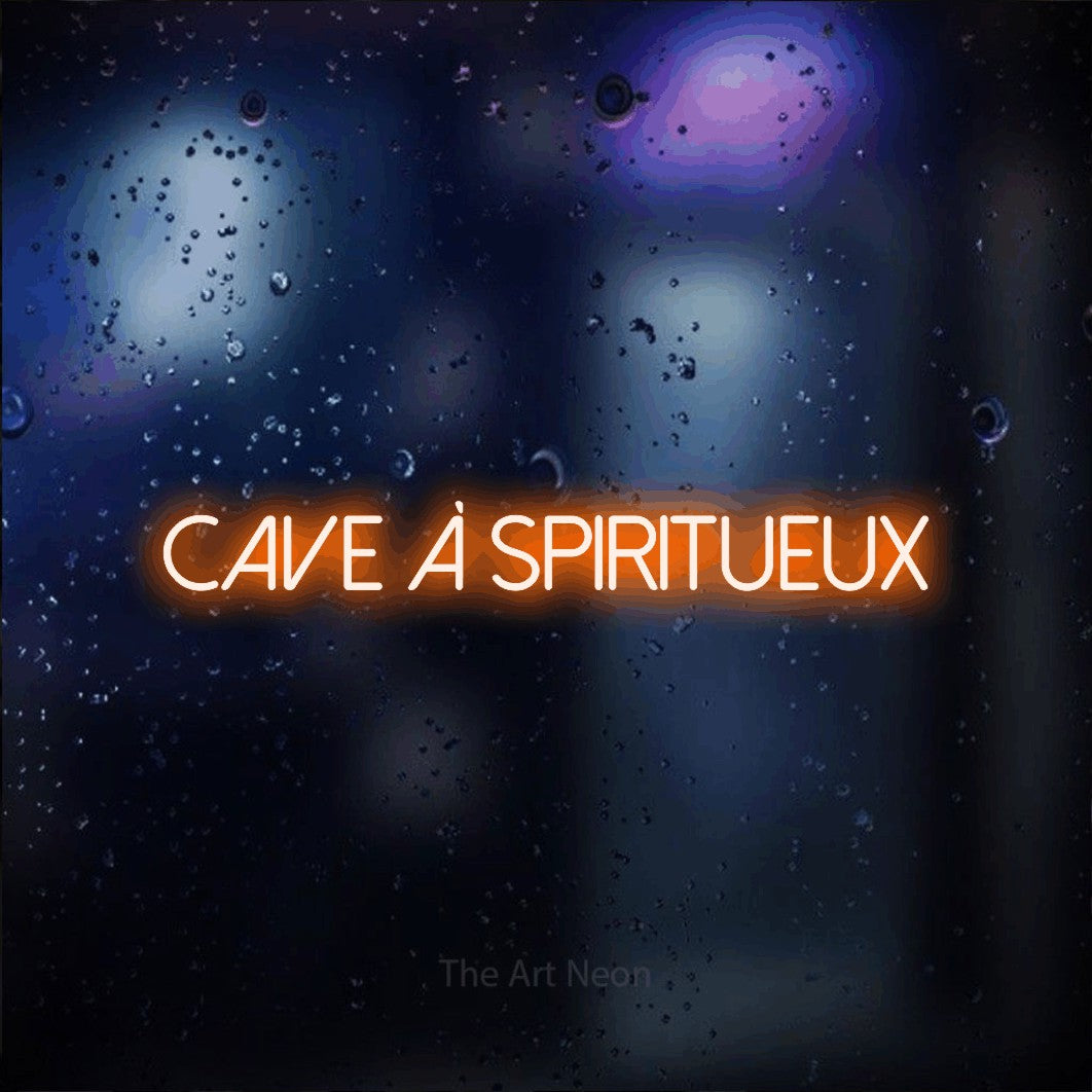 “Cave à spiritueux” LED neon sign in orange, with thin sans-serif lettering, shown against glass with blue and purple reflections.