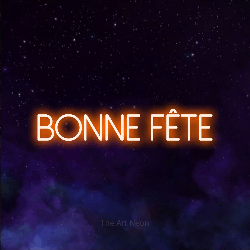 “Bonne fête” LED neon sign in orange, with thin sans-serif lettering, shown against a purple galaxy backdrop.