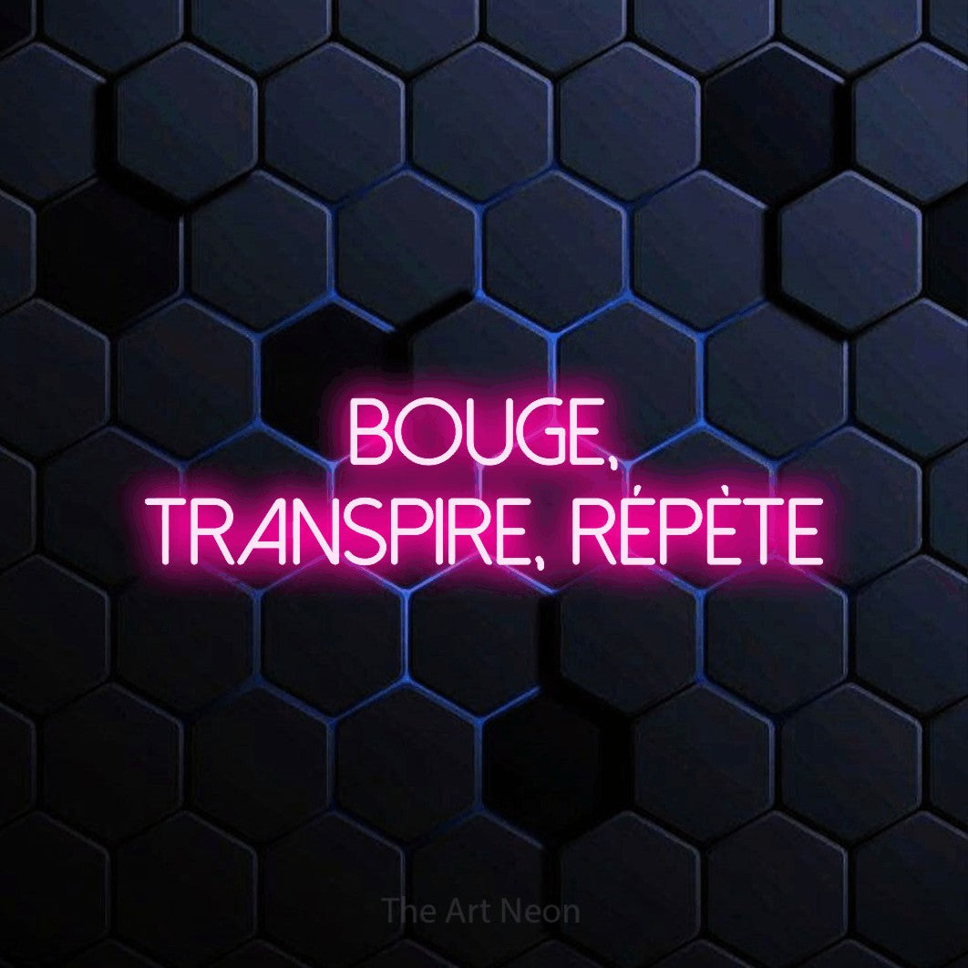 “Bouge, transpire, répète” LED neon sign in hot pink, with thin sans-serif lettering across 2 lines, shown against a dark blue honeycomb pattern.