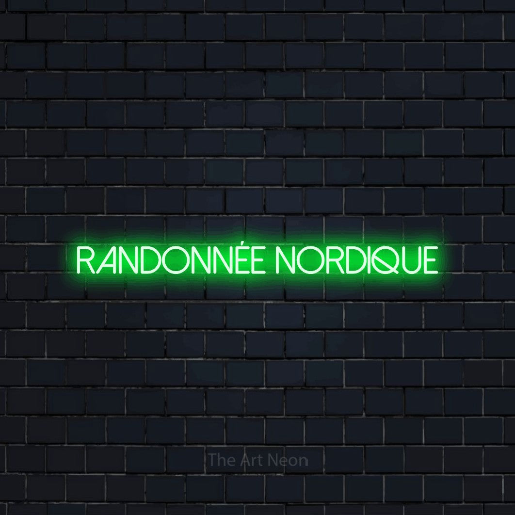 “Randonnée nordique” LED neon sign in green, with thin sans-serif lettering, shown against a dark navy brick wall.