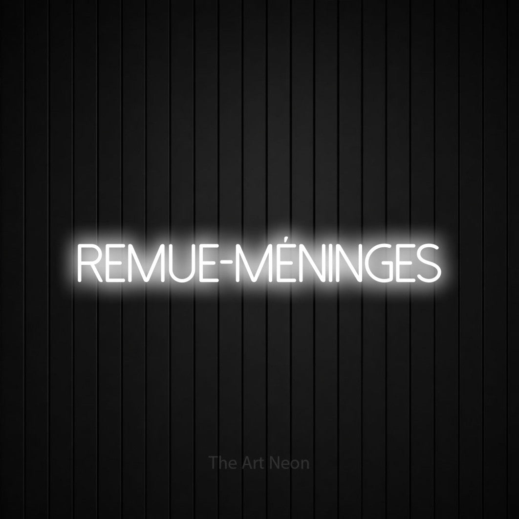 “Remue-méninges” LED neon sign in cool white, with thin sans-serif lettering, shown against black vertical wall slats.