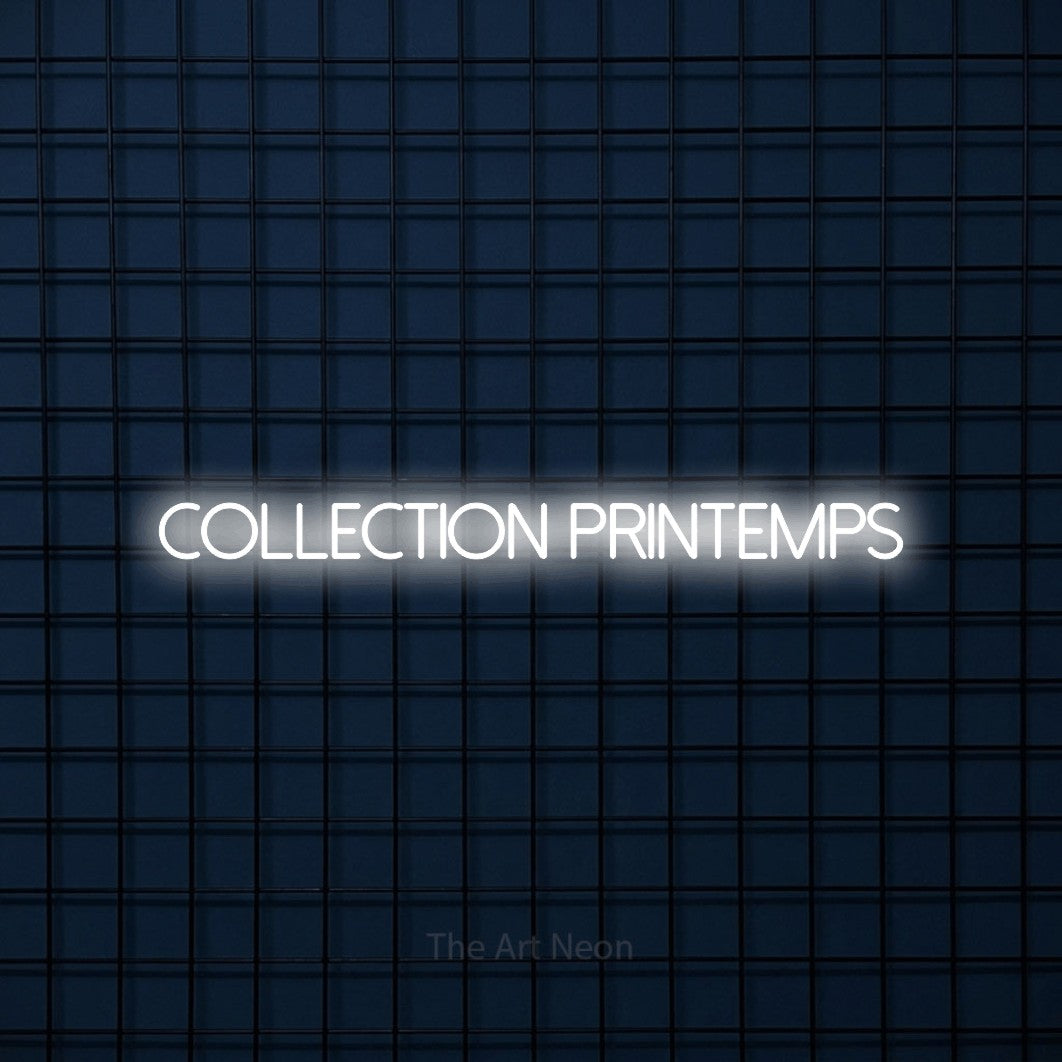 “Collection printemps” LED neon sign in cool white, with thin sans-serif lettering, shown against a dark blue grid.