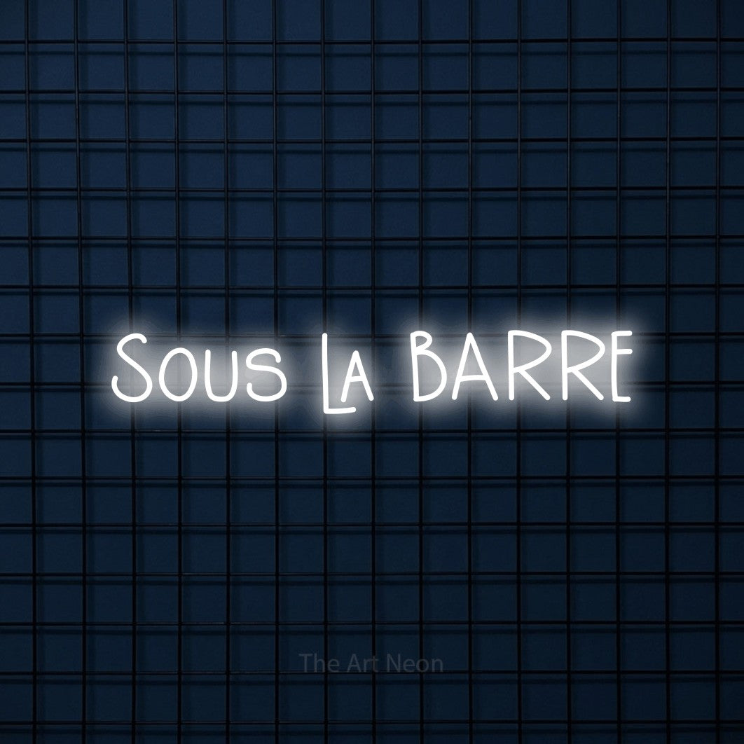 “Sous la barre” LED neon sign in cool white, with narrow hand-drawn lettering, shown against a dark blue grid.