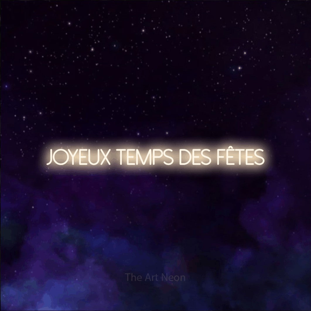 “Joyeux temps des fêtes” LED neon sign in warm white, with thin sans-serif lettering, shown against a purple galaxy backdrop.