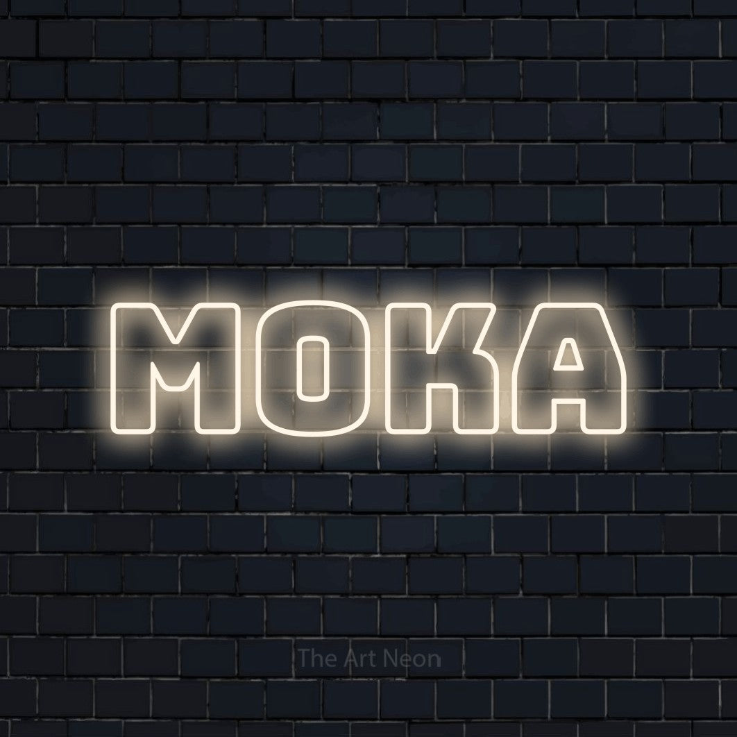 “Moka” LED neon sign in warm white, with bold outline lettering, shown against a dark navy brick wall.