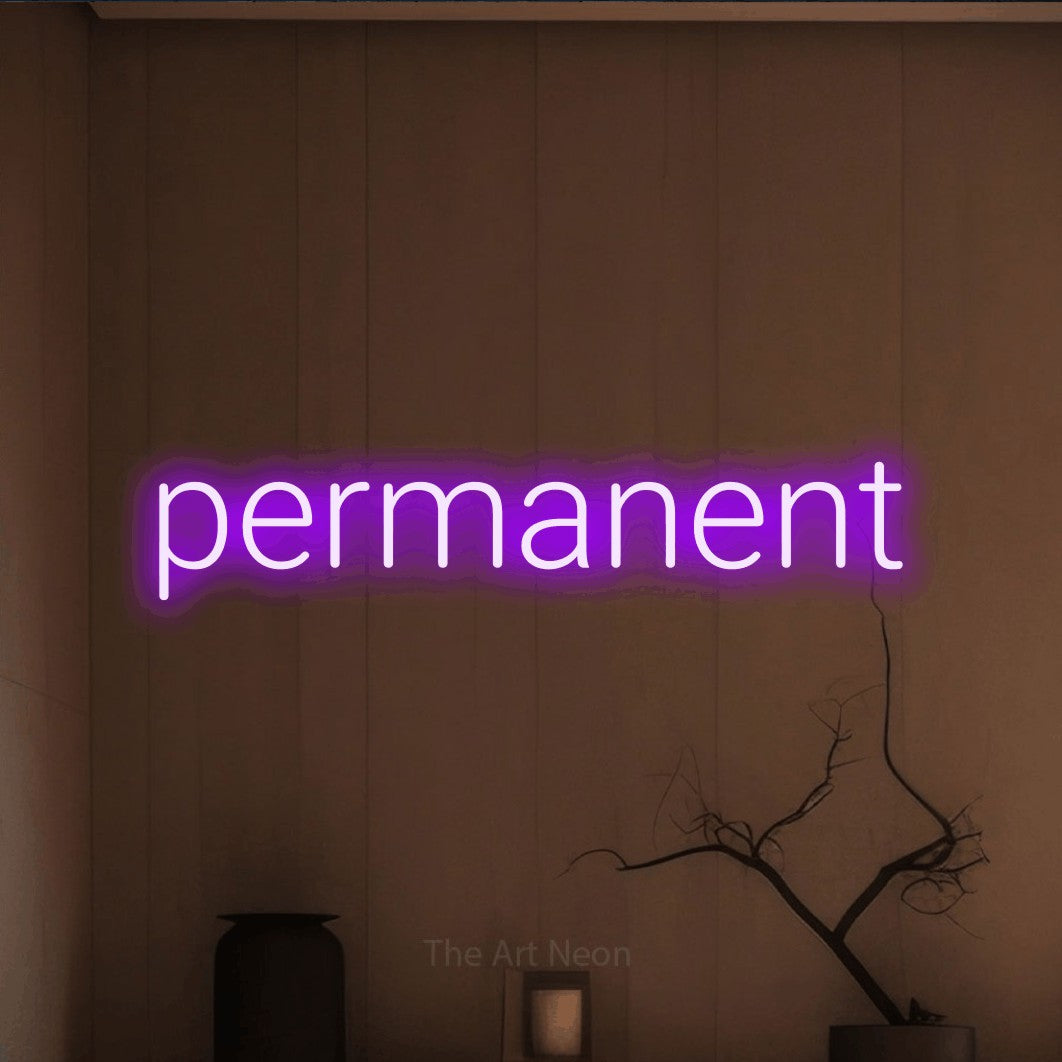 “Permanent” LED neon sign in purple, with rounded sans-serif lettering, shown against a simple earth-toned interior.