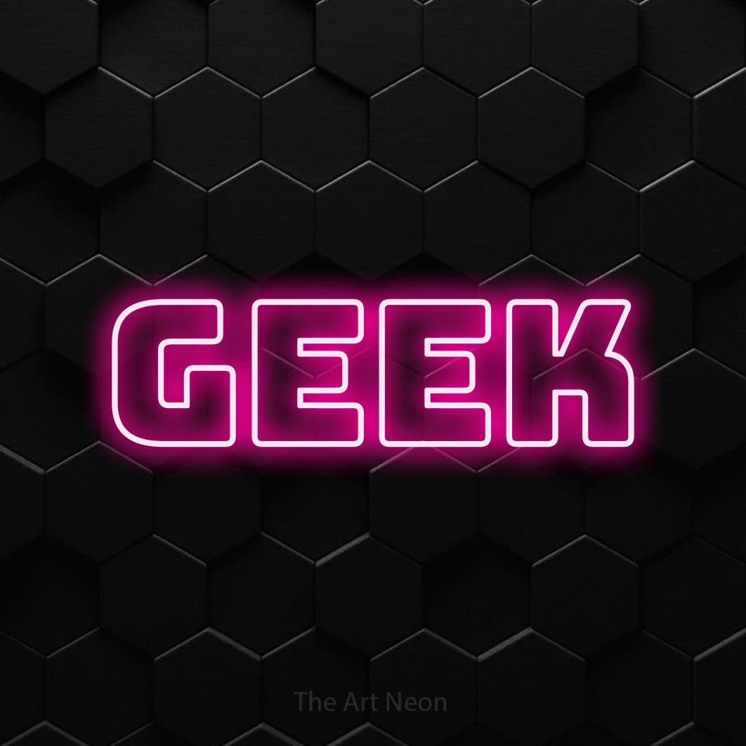 “Geek” LED neon sign in hot pink, with bold outline lettering, shown against black hexagonal wall tiles.