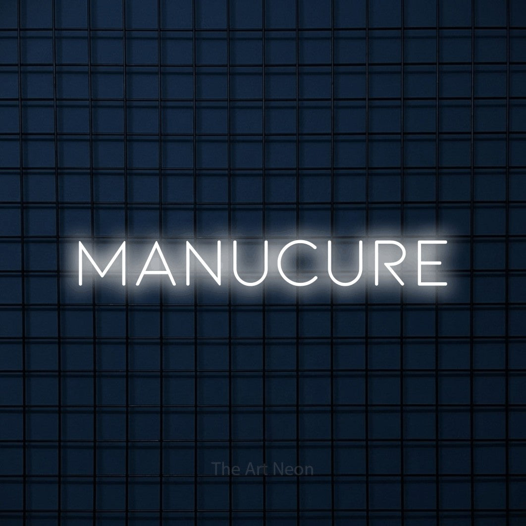 “Manucure” LED neon sign in cool white, with thin, widely spaced lettering, shown against a dark blue grid.