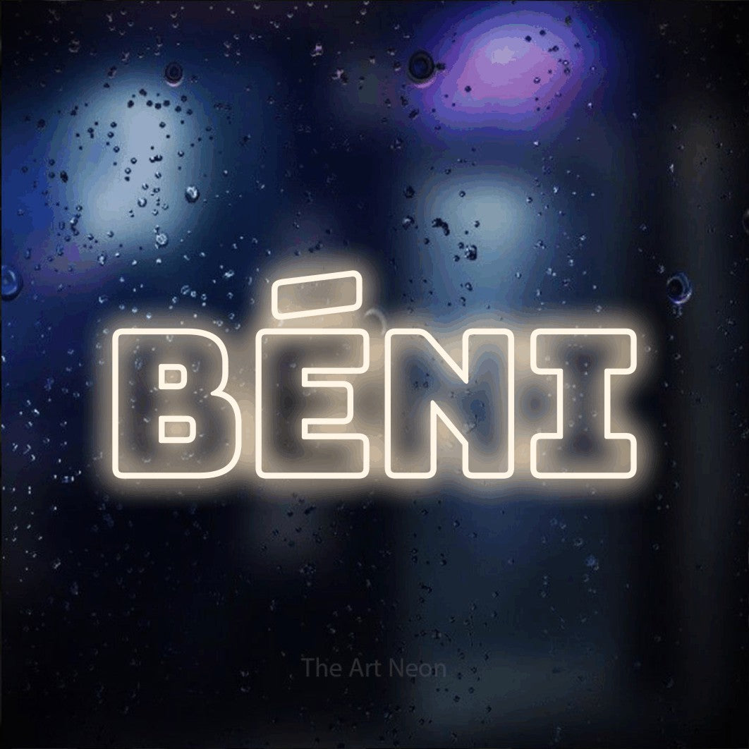 “Béni” LED neon sign in warm white, with bold outline lettering, shown against glass with blue and purple reflections.
