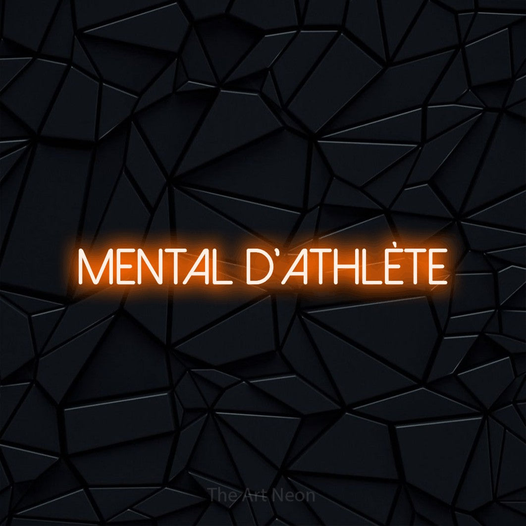 “Mental d'athlète” LED neon sign in orange, with thin sans-serif lettering, shown against a black polygonal surface.