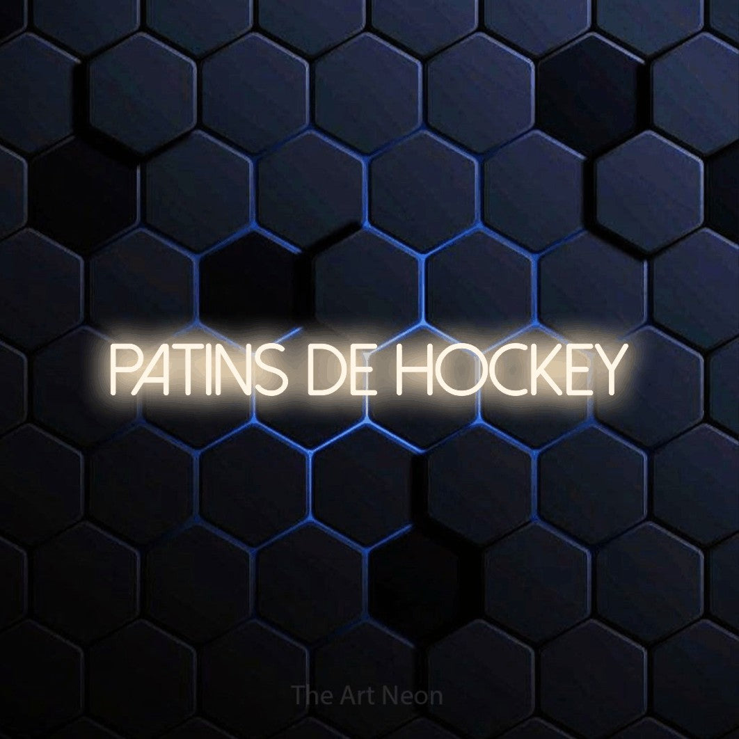 “Patins de hockey” LED neon sign in warm white, with thin sans-serif lettering, shown against a dark blue honeycomb pattern.