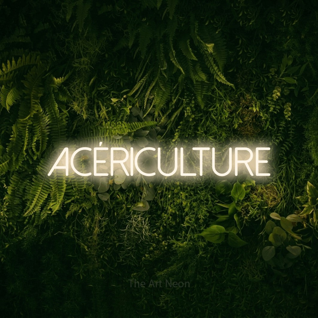 “Acériculture” LED neon sign in warm white, with thin sans-serif lettering, shown against a dark moss and forest backdrop.