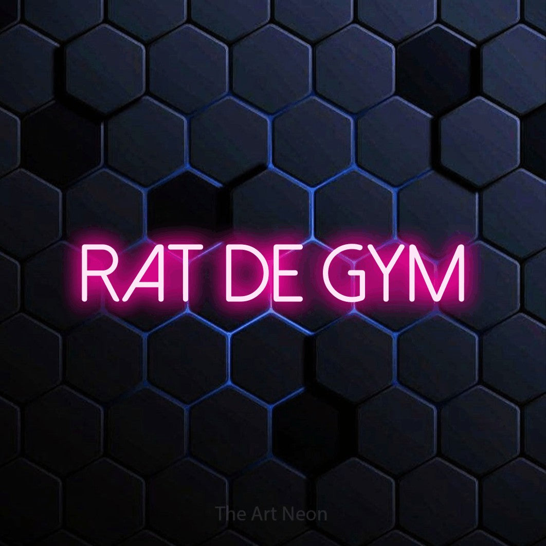 “Rat de gym” LED neon sign in hot pink, with thin sans-serif lettering, shown against a dark blue honeycomb pattern.