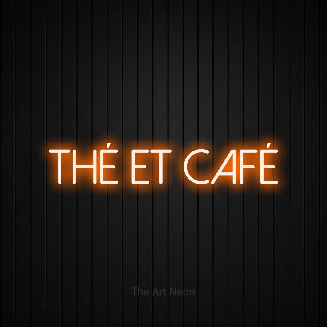 “Thé et café” LED neon sign in orange, with thin sans-serif lettering, shown against black vertical wall slats.
