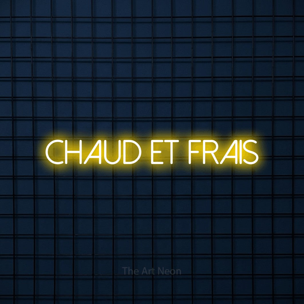 “Chaud et frais” LED neon sign in yellow, with thin sans-serif lettering, shown against a dark blue grid.
