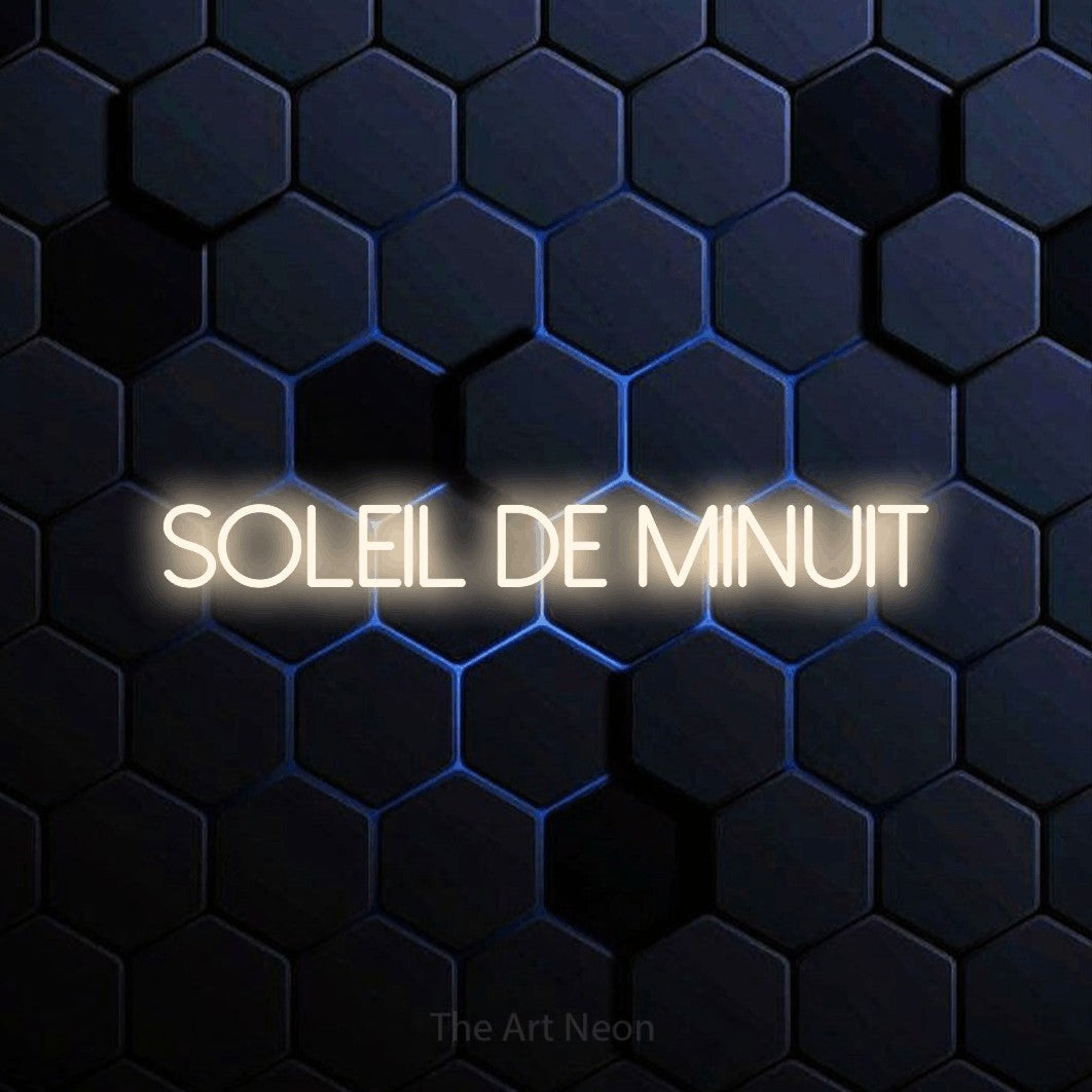 “Soleil de minuit” LED neon sign in warm white, with thin sans-serif lettering, shown against a dark blue honeycomb pattern.