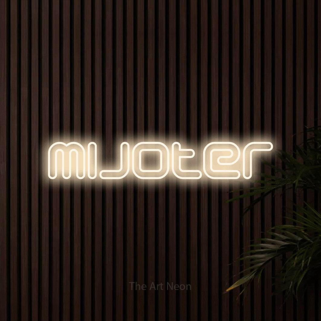 “Mijoter” LED neon sign in warm white, with futuristic double-line lettering, shown against dark wooden wall slats.