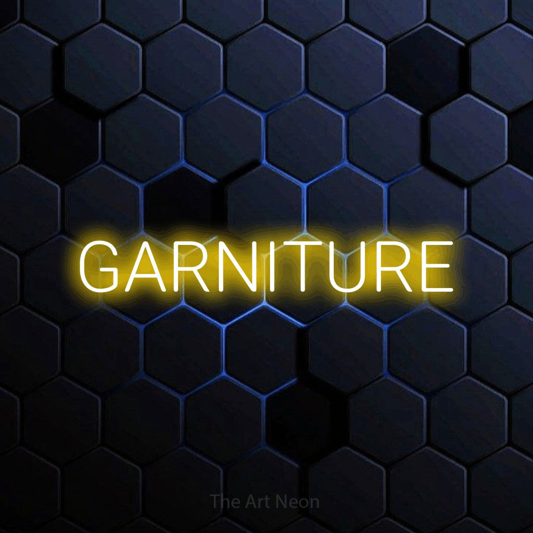 “Garniture” LED neon sign in yellow, with rounded sans-serif lettering, shown against a dark blue honeycomb pattern.