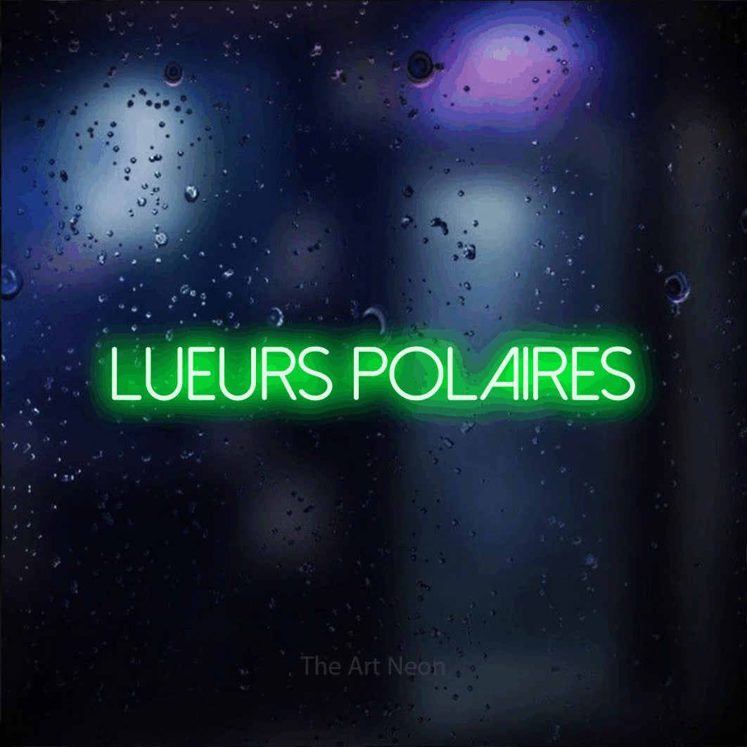“Lueurs polaires” LED neon sign in green, with thin sans-serif lettering, shown against glass with blue and purple reflections.